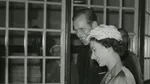 The Queen Elizabeth II and Prince Phillip smiling, during a royal visit to Unilever's soap factory in Port Sunlight